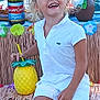 child, smiling, curly_hair, white_clothing, pineapple_cup, tiki_theme, party, decorations, colorful, happy, sitting, drink, table, bottle, people, festival, tropical, celebration, fun, outdoor