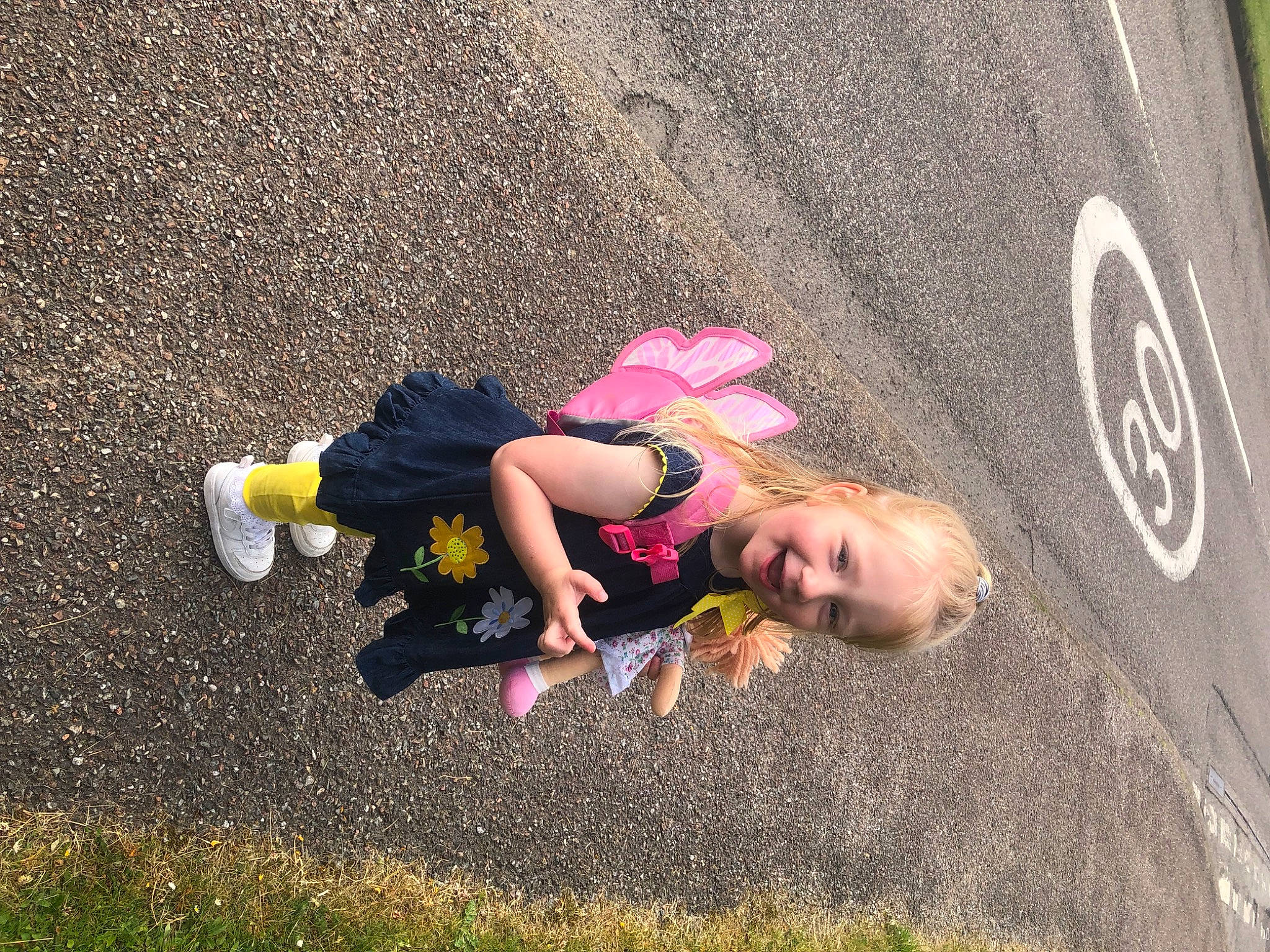 Isla joined the competition — help win amazing prizes! asphalt, child, concrete, cool, fun, grass, happy, hat, joy, landscape, leisure, magenta, people_in_nature, person, recreation, road, road_surface, shadow, sidewalk, soil