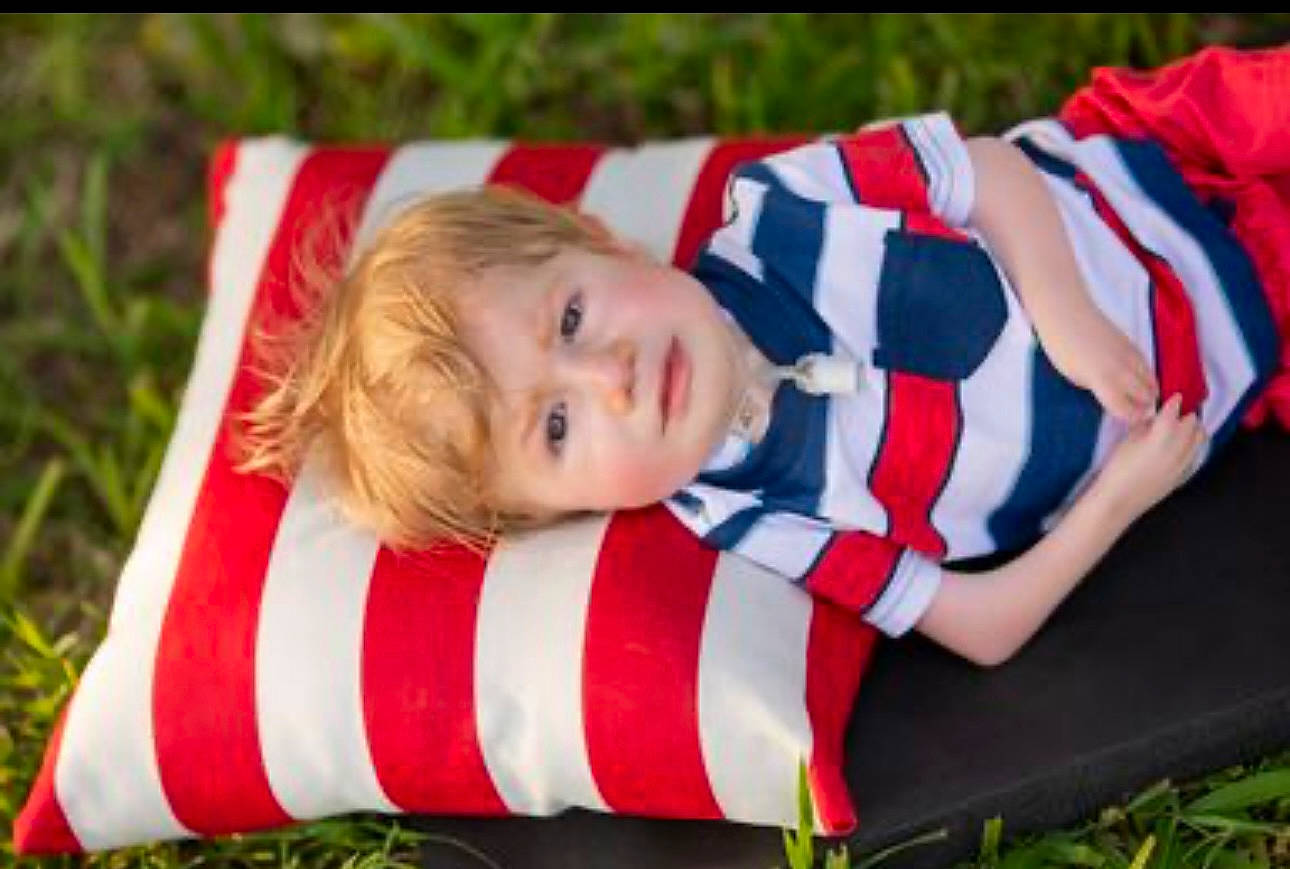 Colt joined the competition — help win amazing prizes! automotive_wheel_system, baby, child, christmas, event, face, flag, flag_day_usa, flag_of_the_united_states, fun, grass, hand, happy, holiday, pattern, people_in_nature, person, plant, sitting, toddler