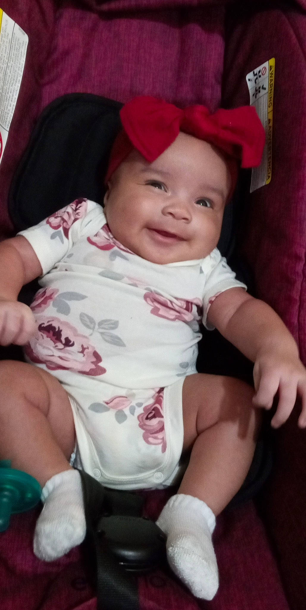 Emersyn joined the competition — help win amazing prizes! baby, baby_toddler_clothing, cap, cheek, child, comfort, eye, facial_expression, fun, happy, headwear, human_leg, joy, lap, magenta, person, pink, sitting, skin, sleeve