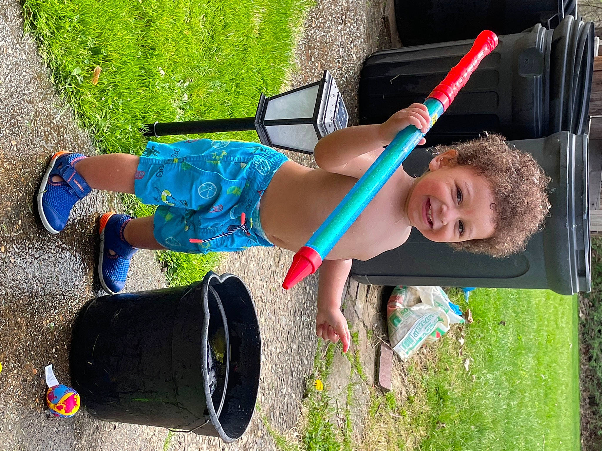 Quran is registered to the contest to win money with this photo: child, electric_blue, fun, grass, green, happy, human_leg, joy, leisure, pattern, people_in_nature, person, plant, play, recreation, shorts, smile, thigh, toddler, tree