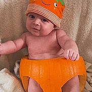 Kairo joined the competition — help win amazing prizes! autumn, baby, blanket, child, cozy, cute, fall, funny_hat, happy, hat, indoors, infant, orange, person, plush, pumpkin, skin, smile, socks, soft