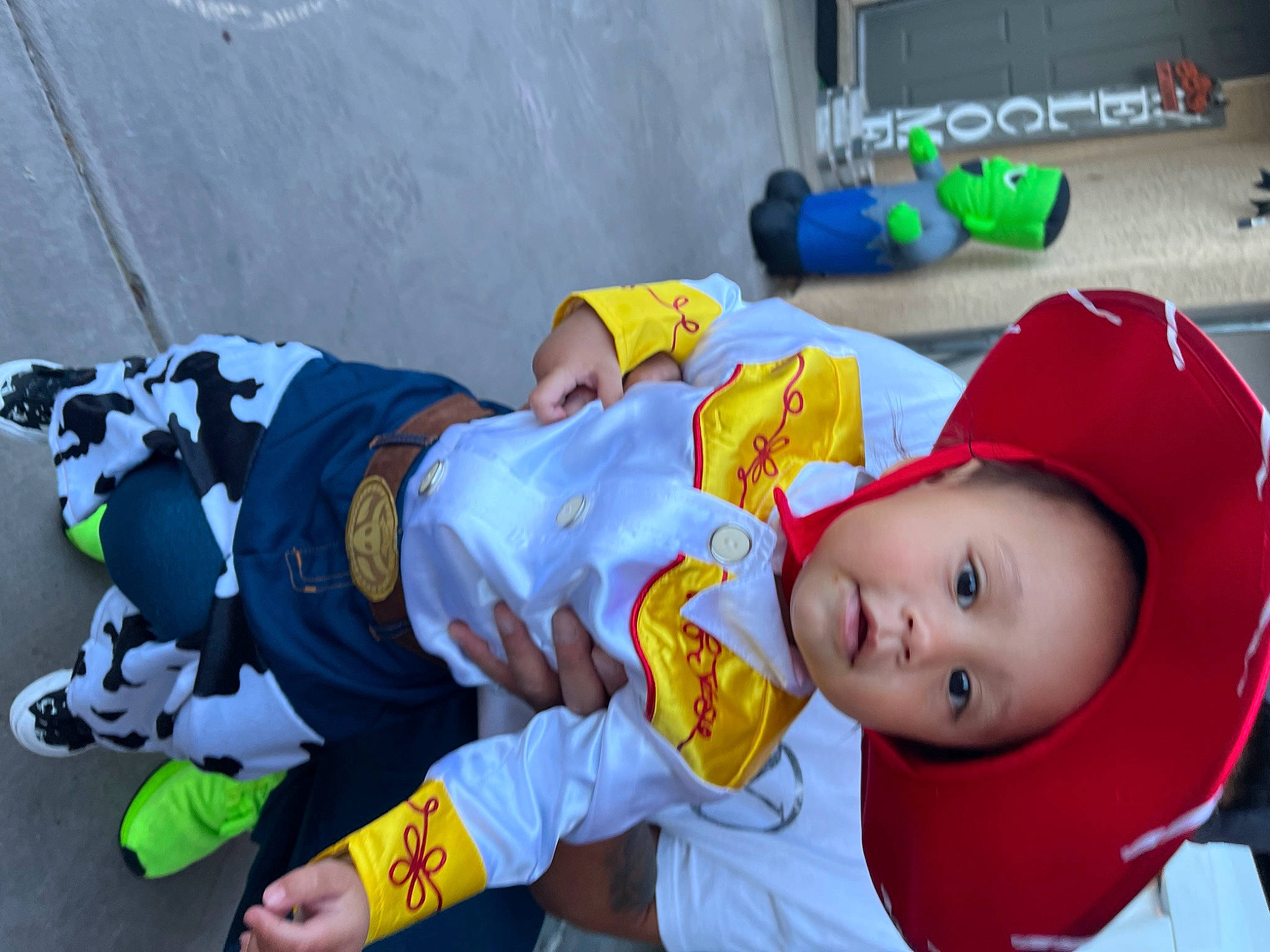 Kaislee joined the competition — help win amazing prizes! baby, baby_products, baby_toddler_clothing, bottle, child, costume, event, face, fun, happy, hat, leisure, person, personal_protective_equipment, sitting, smile, t_shirt, toddler, white, world