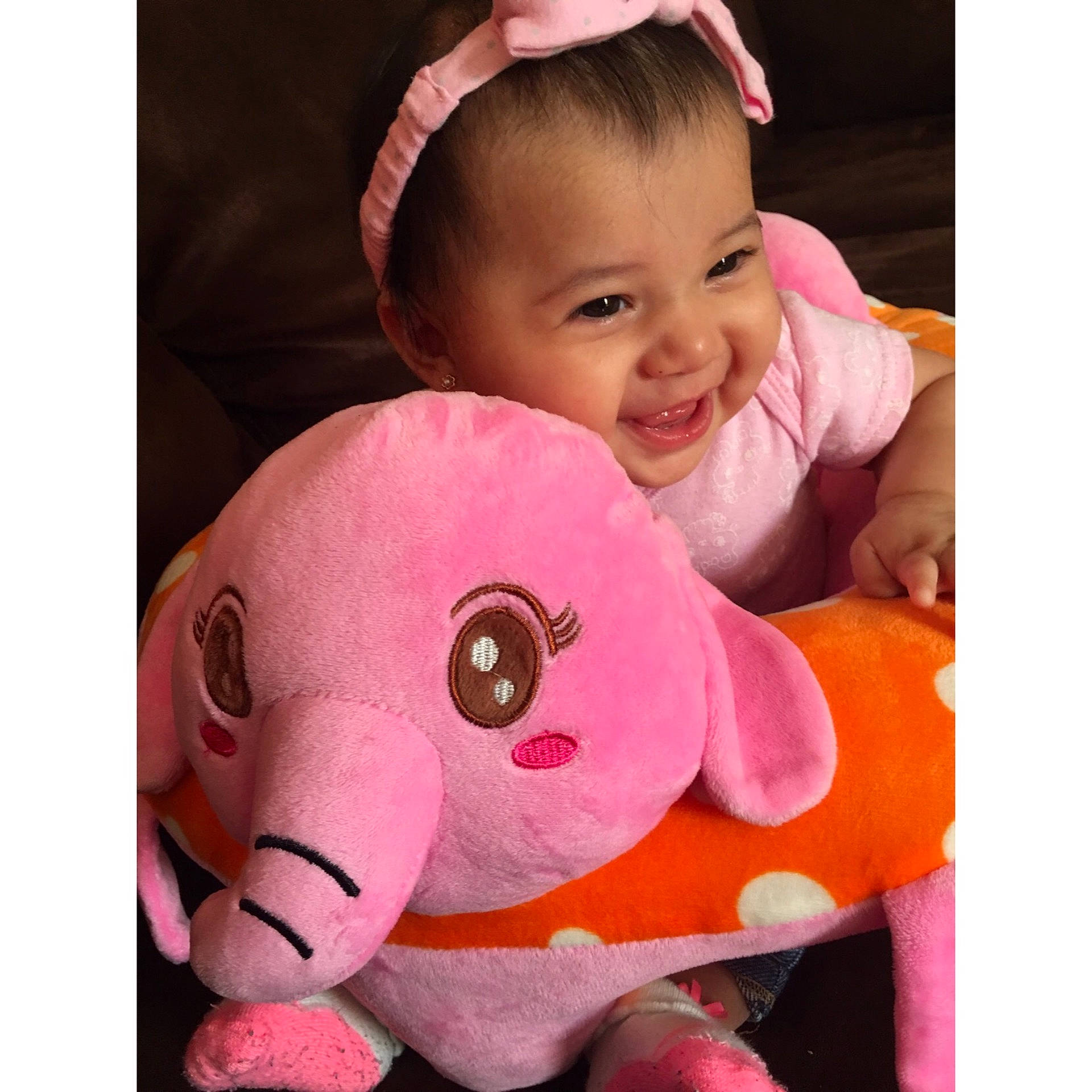 Angela joined the competition — help win amazing prizes! baby_toys, cheek, child, ear, head, infant, joy, magenta, material, neck, nose, person, pig, pig_like_mammal, pink, plush, product, snout, stuffed_toy, textile