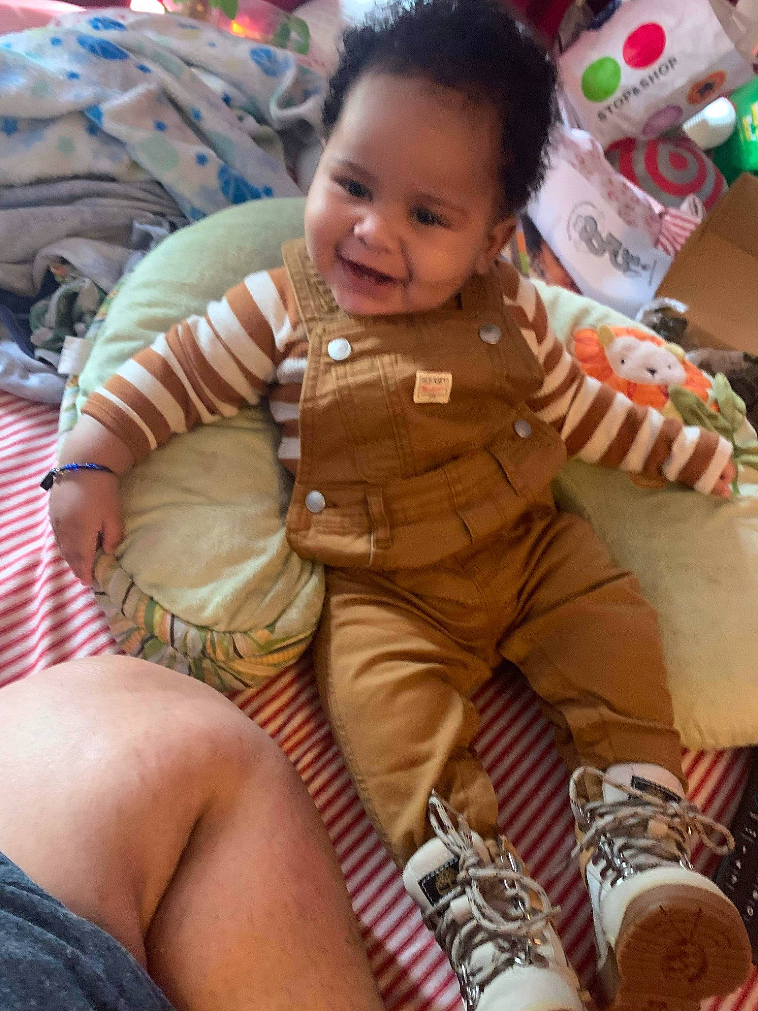 Aidan joined the competition — help win amazing prizes! baby, baby_toddler_clothing, cheek, child, comfort, eye, finger, fun, happy, human_leg, joy, knee, mammal, person, sitting, skin, smile, stuffed_toy, textile, thigh