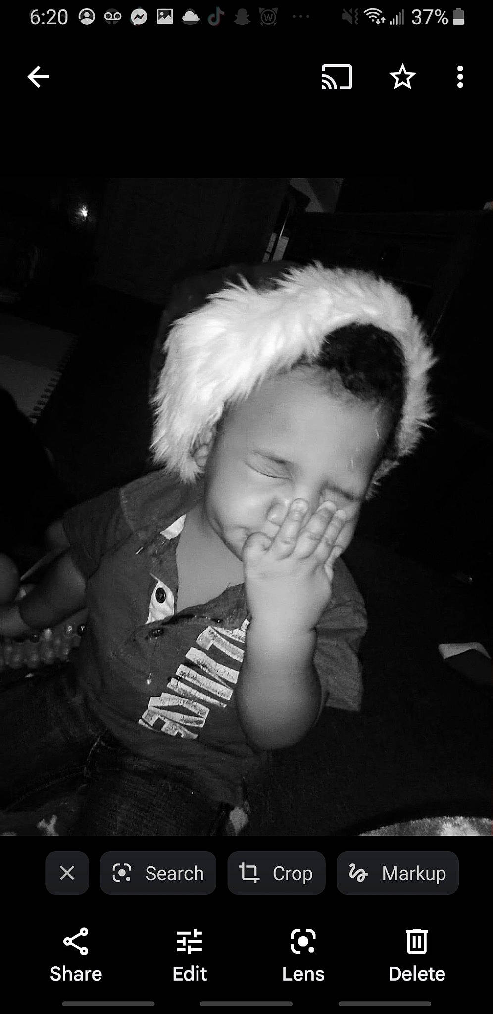 Lennon is registered to the contest to win money with this photo: baby, cheek, child, darkness, ear, entertainment, eyelash, flash_photography, fun, fur, gesture, happy, lip, monochrome, monochrome_photography, night, person, portrait, portrait_photography, toddler