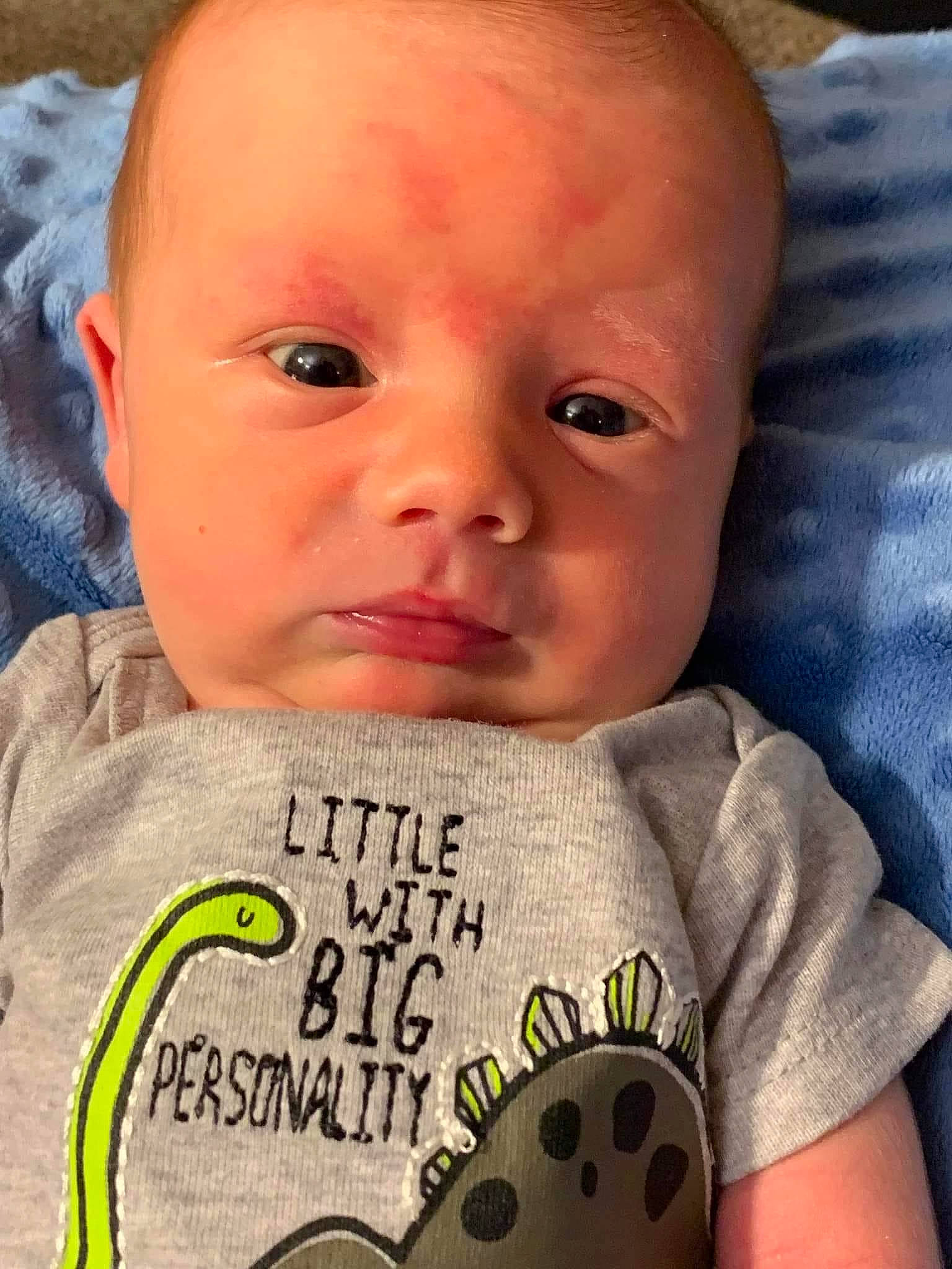 Kolten is registered to the contest to win money with this photo: baby, baby_toddler_clothing, cheek, chin, cool, eyebrow, eyelash, face, facial_expression, forehead, happy, lip, mammal, mouth, neck, nose, person, product, sleeve, t_shirt