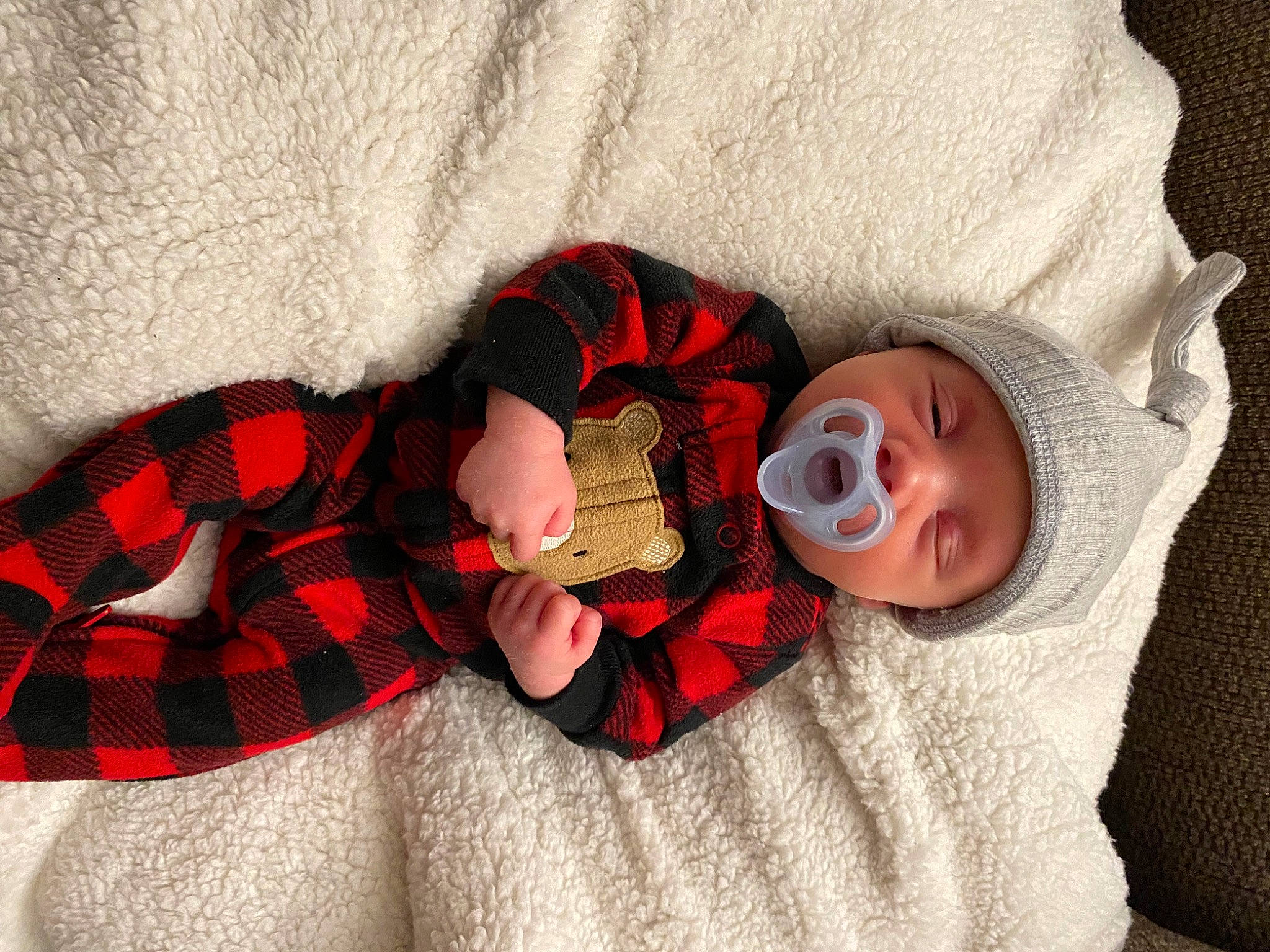 Kolten joined the competition — help win amazing prizes! arm, baby, baby_sleeping, baby_toddler_clothing, comfort, eye, finger, hand, head, headgear, headwear, human_body, leg, linens, person, product, skin, sleeve, tartan, textile
