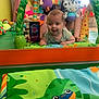 adult, baby, child, colorful, crawling, cute, giraffe_toy, green, happiness, indoor, mirror, orange, pattern, person, phone, play_mat, purple, reflection, smiling, toys