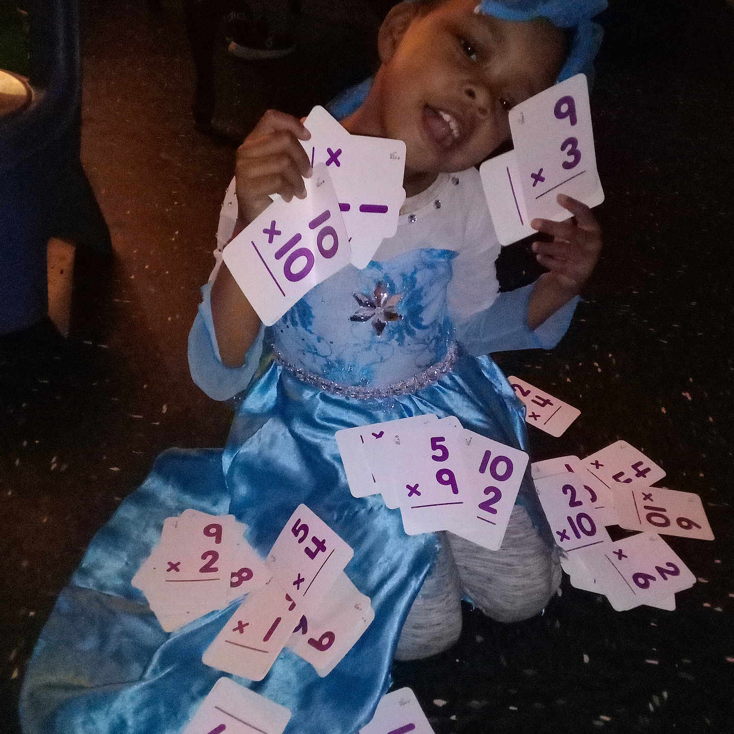 Jamaela joined the competition — help win amazing prizes! baby, bodypart, clothing, costume, dress, face, finger, hand, happy, head, machine, number, paper, person, photography, portrait, sitting, symbol, text, wheel