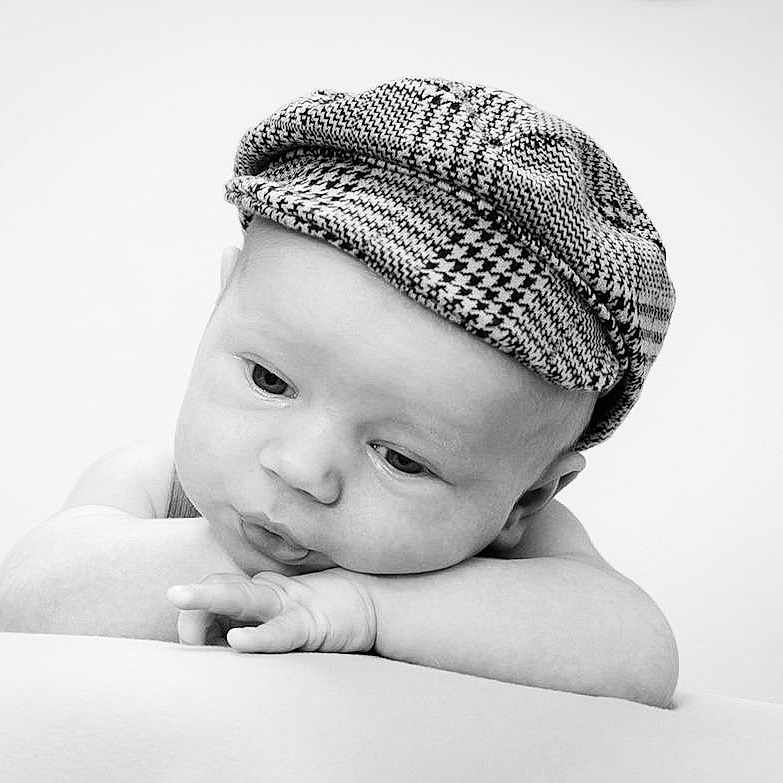 Jaxson joined the competition — help win amazing prizes! baby, baseballcap, beanie, bonnet, cap, clothing, face, happy, hat, head, newborn, person, photography, portrait, smile