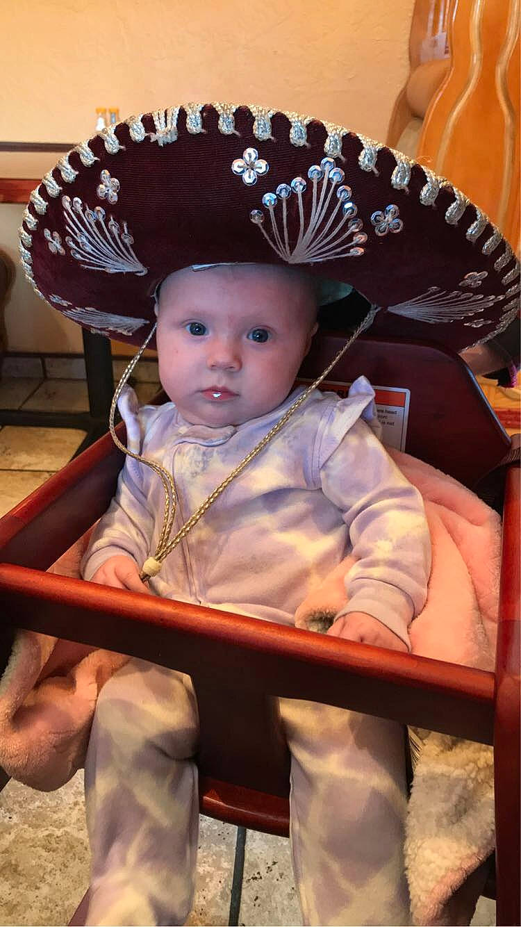 Julia joined the competition — help win amazing prizes! baby, baby_products, baby_toddler_clothing, cheek, child, chin, costume_hat, event, eye, fashion_accessory, fun, hat, headgear, headwear, human_body, jewellery, person, pink, product, sitting
