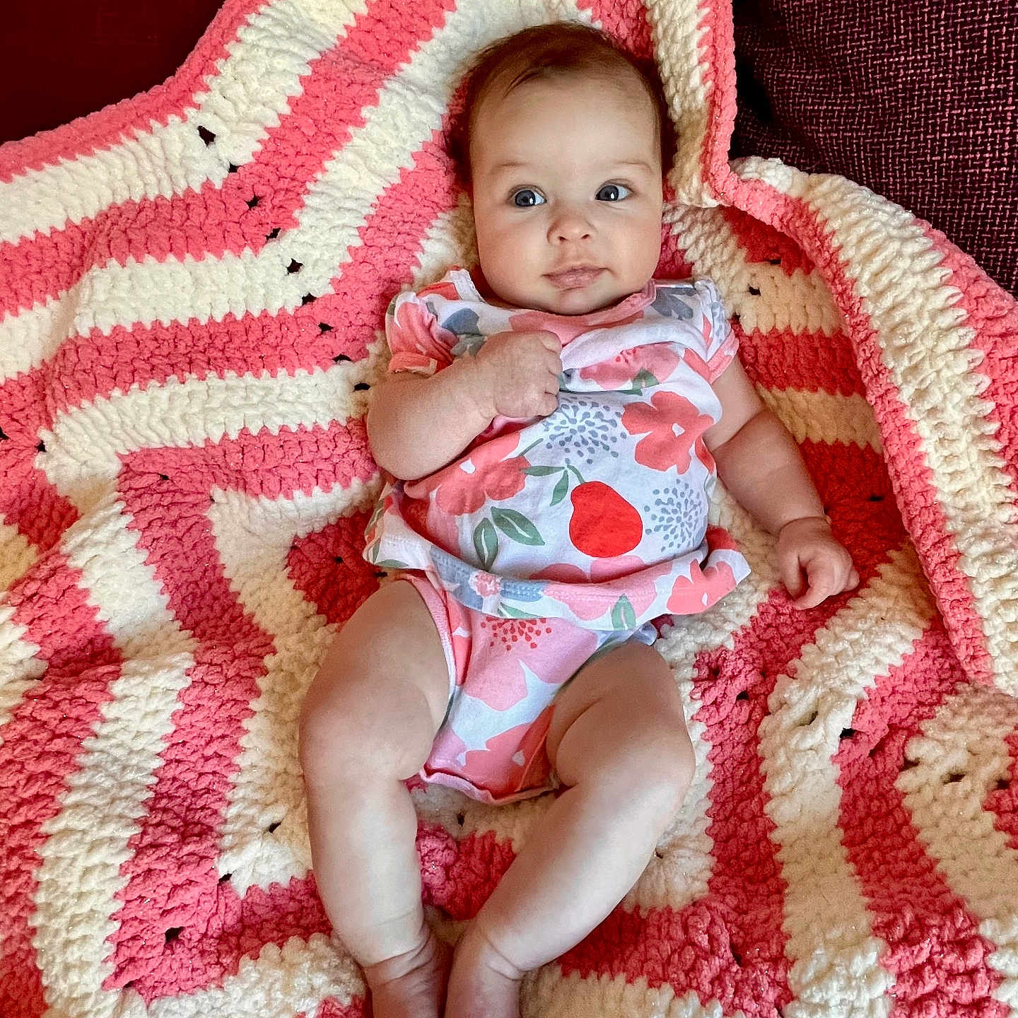 Aria joined the competition — help win amazing prizes! baby, blanket, bodypart, couch, cushion, face, finger, furniture, hand, happy, head, homedecor, newborn, person, photography, portrait, quilt, sitting, smile, towel