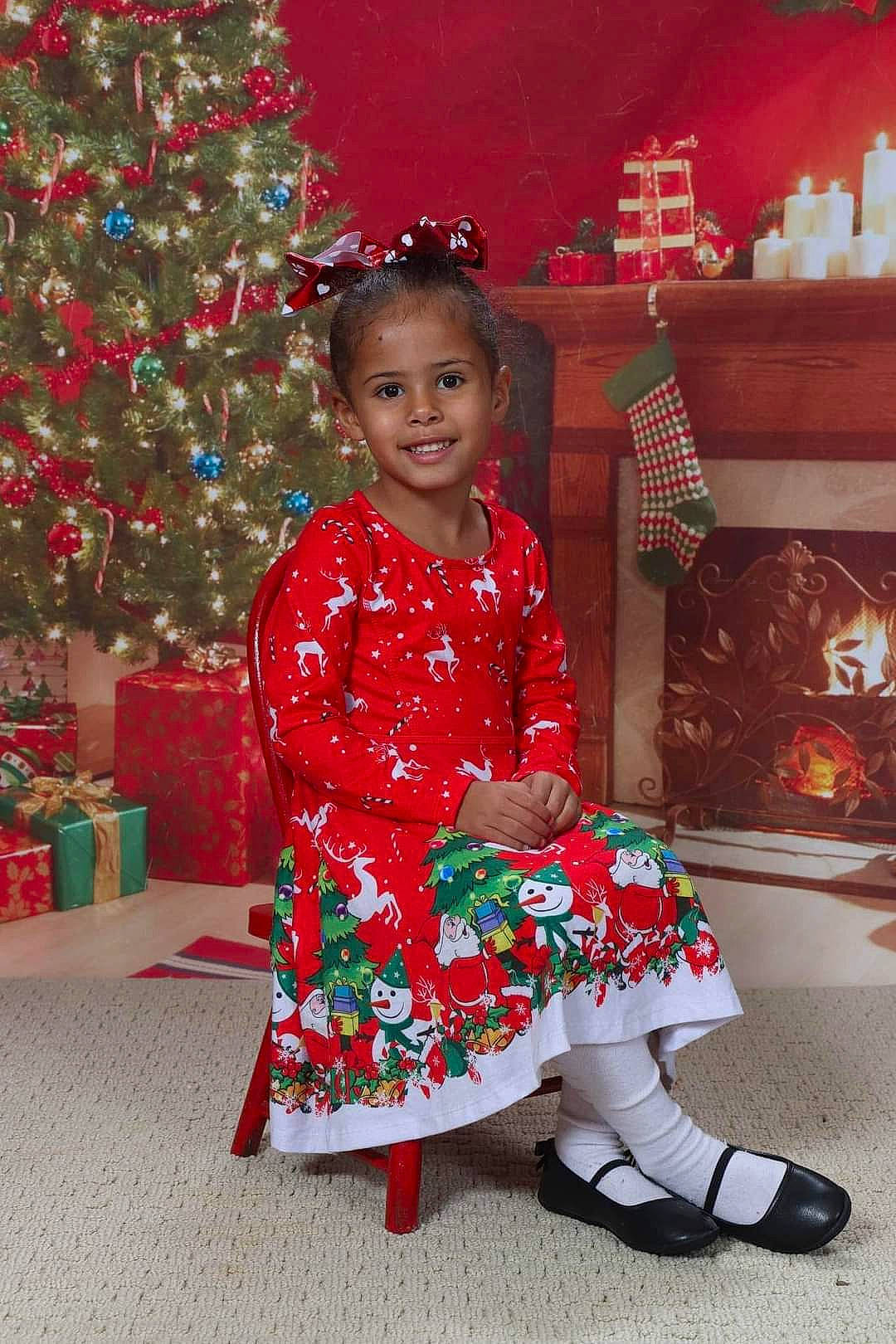 Stormy joined the competition — help win amazing prizes! baby_toddler_clothing, child, christmas, christmas_decoration, christmas_eve, christmas_ornament, christmas_tree, decoration, dress, event, happy, holiday, joy, person, red, sleeve, smile, sock, toddler, tradition