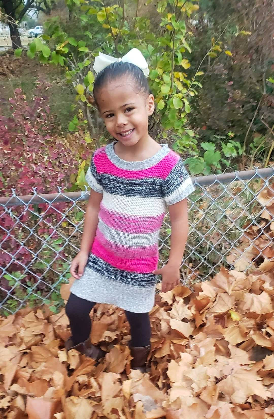 Stormy joined the competition — help win amazing prizes! adaptation, baby_toddler_clothing, child, face, fawn, fence, fun, grass, happy, head, joy, pattern, people_in_nature, person, pink, plant, shorts, smile, t_shirt, thigh