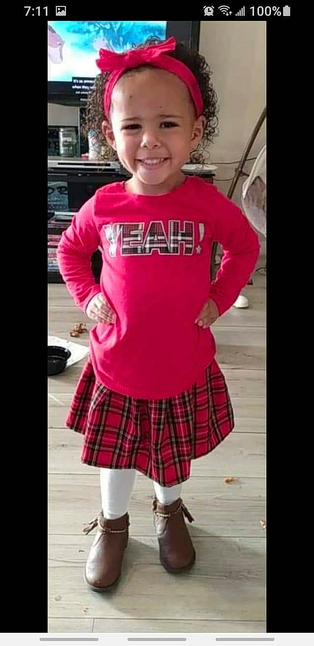 Stormy joined the competition — help win amazing prizes! baby_toddler_clothing, clothing, cool, happy, headwear, joy, magenta, neck, person, photograph, pink, plaid, purple, red, shoe, sleeve, smile, sock, t_shirt, tartan