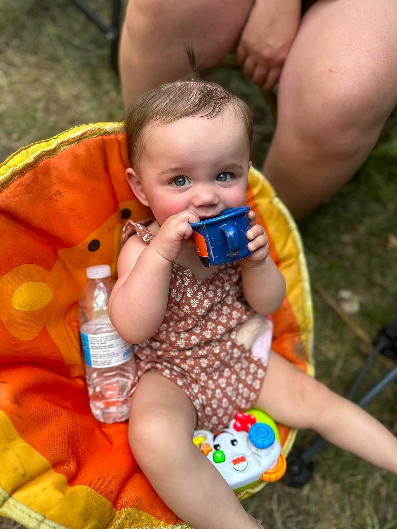 Lennyn joined the competition — help win amazing prizes! arm, baby, child, face, finger, fun, grass, hand, happy, head, human_body, leg, leisure, orange, organ, people, person, skin, summer, toddler