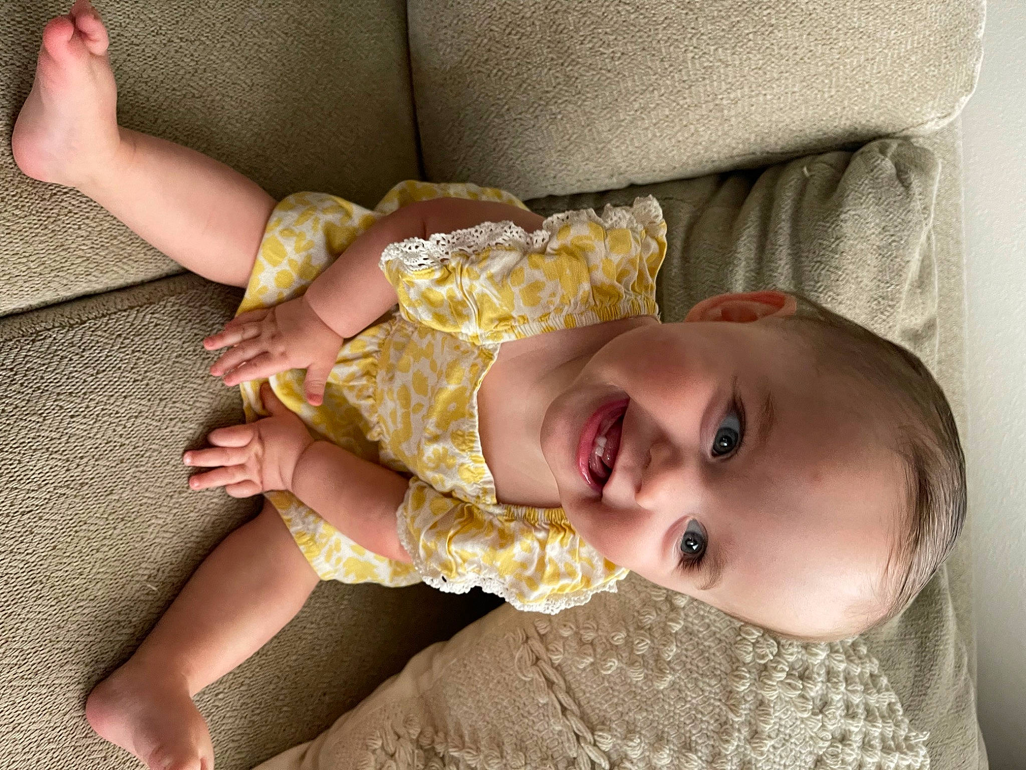 Lennyn is registered to the contest to win money with this photo: baby, baby_toddler_clothing, blond, comfort, couch, dress, eye, eyelash, happy, hat, head, headgear, human_body, iris, joy, lip, nose, person, skin, smile