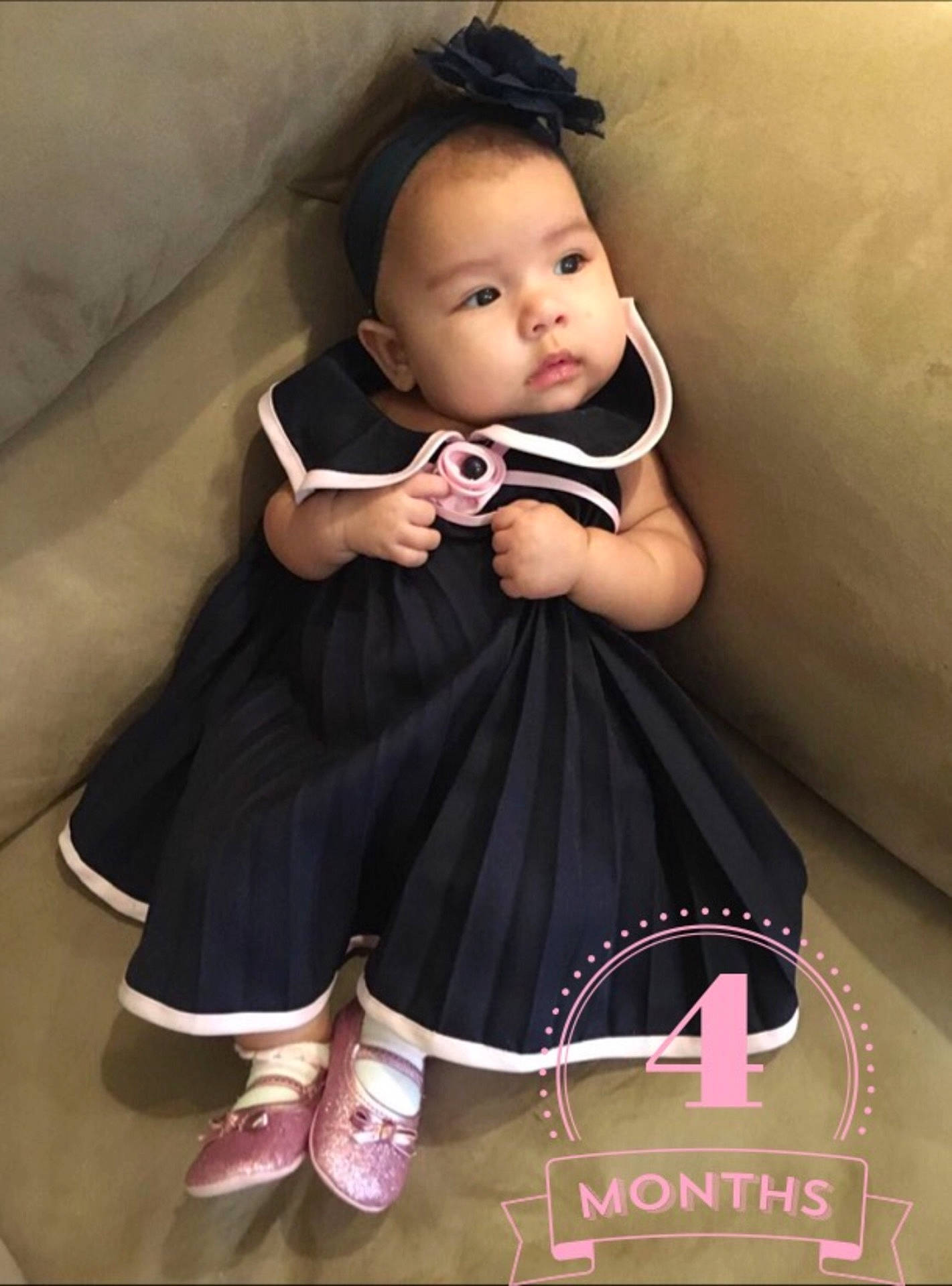 Meilan is registered to the contest to win money with this photo: child, clothing, costume, dress, infant, person, toddler