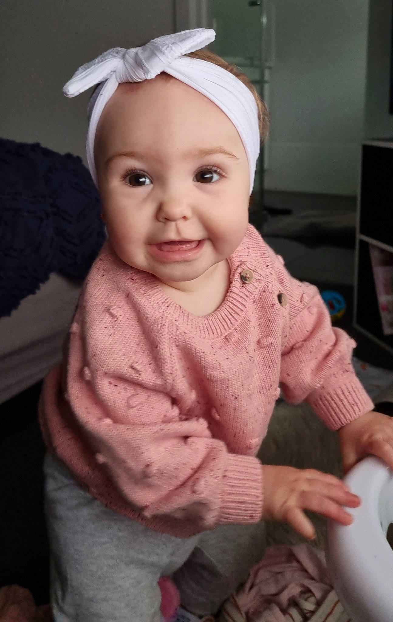 Ruby joined the competition — help win amazing prizes! baby, baby_toddler_clothing, cap, cheek, child, eye, fashion_accessory, fun, happy, headband, headpiece, headwear, input_device, joy, lip, peripheral, person, sitting, skin, sleeve