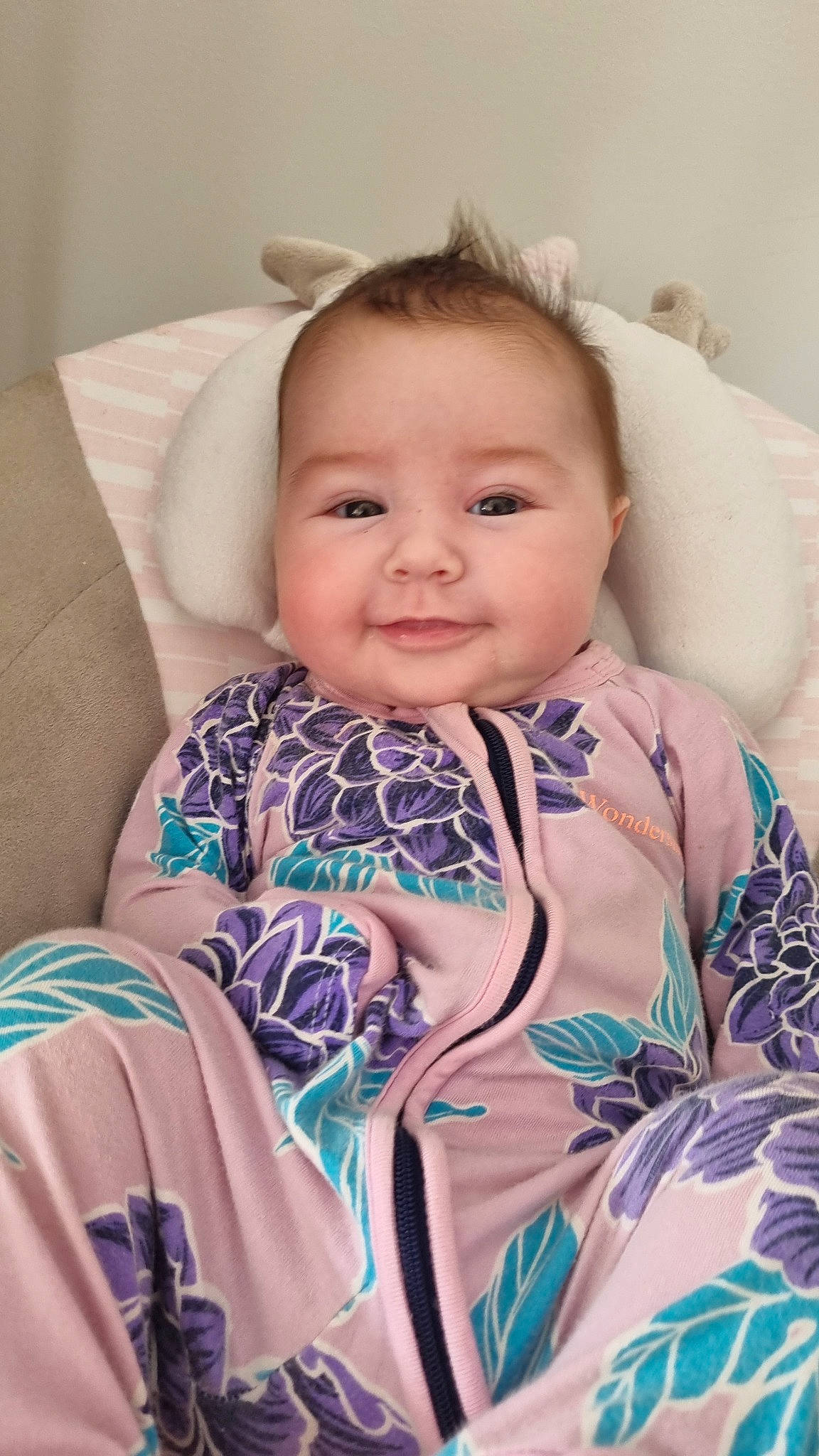 Zarli is registered to the contest to win money with this photo: baby, baby_toddler_clothing, cheek, child, comfort, eye, eyelash, face, happy, head, iris, joy, linens, neck, pattern, person, product, room, skin, sleeve