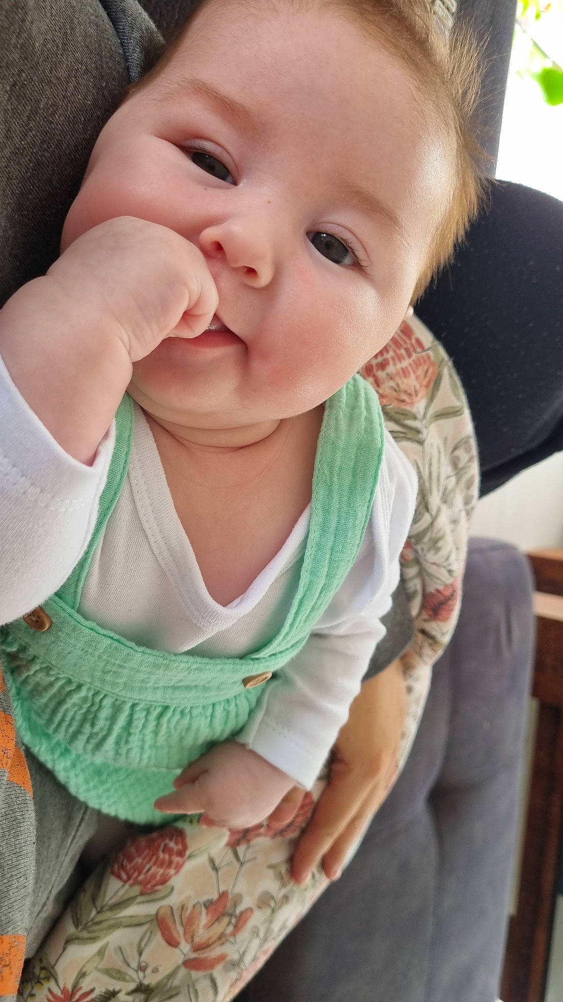 Zarli is registered to the contest to win money with this photo: baby, baby_toddler_clothing, cheek, collar, comfort, eye, eyebrow, eyelash, finger, gesture, happy, iris, lip, mouth, nose, person, skin, sleeve, smile, thumb