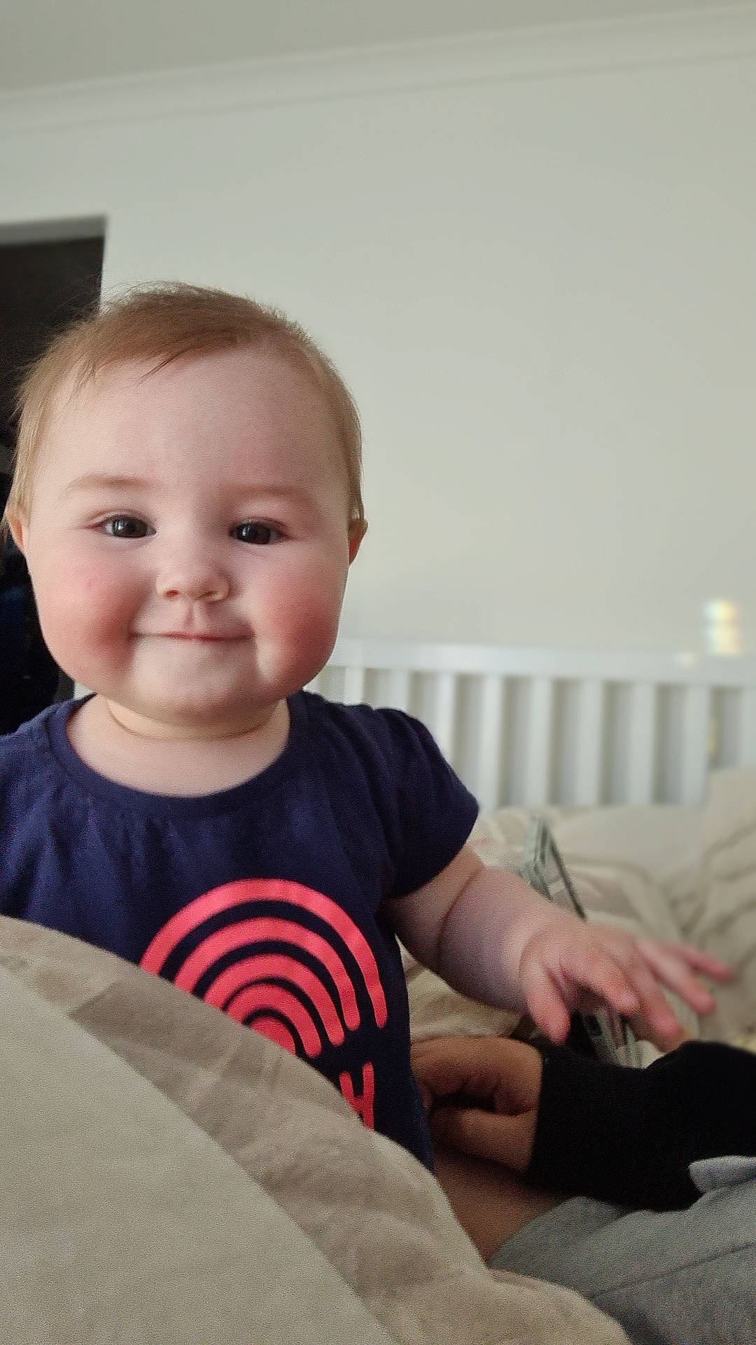 Zarli Mae is registered to the contest to win money with this photo: baby, baby_toddler_clothing, cheek, child, comfort, elbow, eye, face, finger, flash_photography, fun, happy, head, joy, person, remote_control, sitting, skin, sleeve, smile