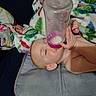 baby, bottle, blanket, child, milk, sleeping, hand, face, skin, infant, bed, comfort, rest, young, peaceful, nurture, indoor, person, couch, clothing