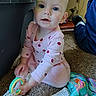 Emberlyn joined the competition — help win amazing prizes! baby, child, infant, pink_clothing, ladybug_pattern, carpet, toy, rings, indoor, person, floor, sitting, cute, curious, blue_eyes, long_sleeves, playtime, home, young_child, candid