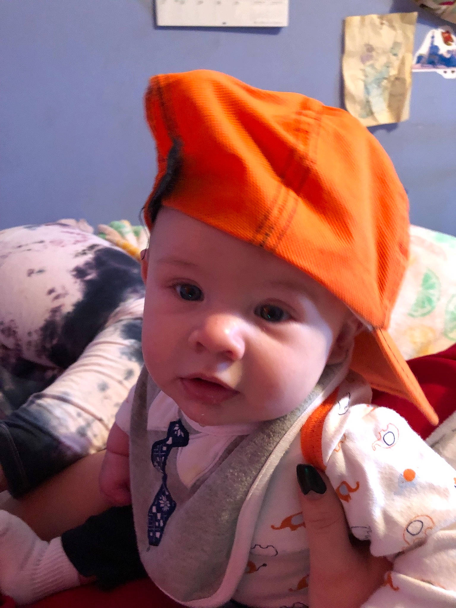 Bo is registered to the contest to win money with this photo: cap, cheek, child, cool, ear, face, forehead, girl, hat, head, headgear, headwear, infant, nose, person, product, skin, smile, toddler