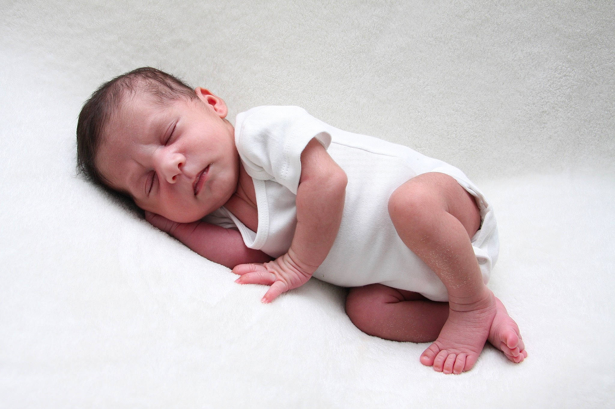 Kingsley is registered to the contest to win money with this photo: baby, baby_toddler_clothing, barefoot, chest, child, comfort, flash_photography, flooring, foot, happy, head, human_leg, knee, nail, person, portrait_photography, sitting, skin, stomach, toddler