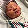 Isabella Marie joined the competition — help win amazing prizes! newborn, baby, sleeping, hat, striped_hat, blanket, striped_blanket, closeup, face, infant, cute, peaceful, soft, wrapped, bed, resting, skin, clothing, indoors, portrait