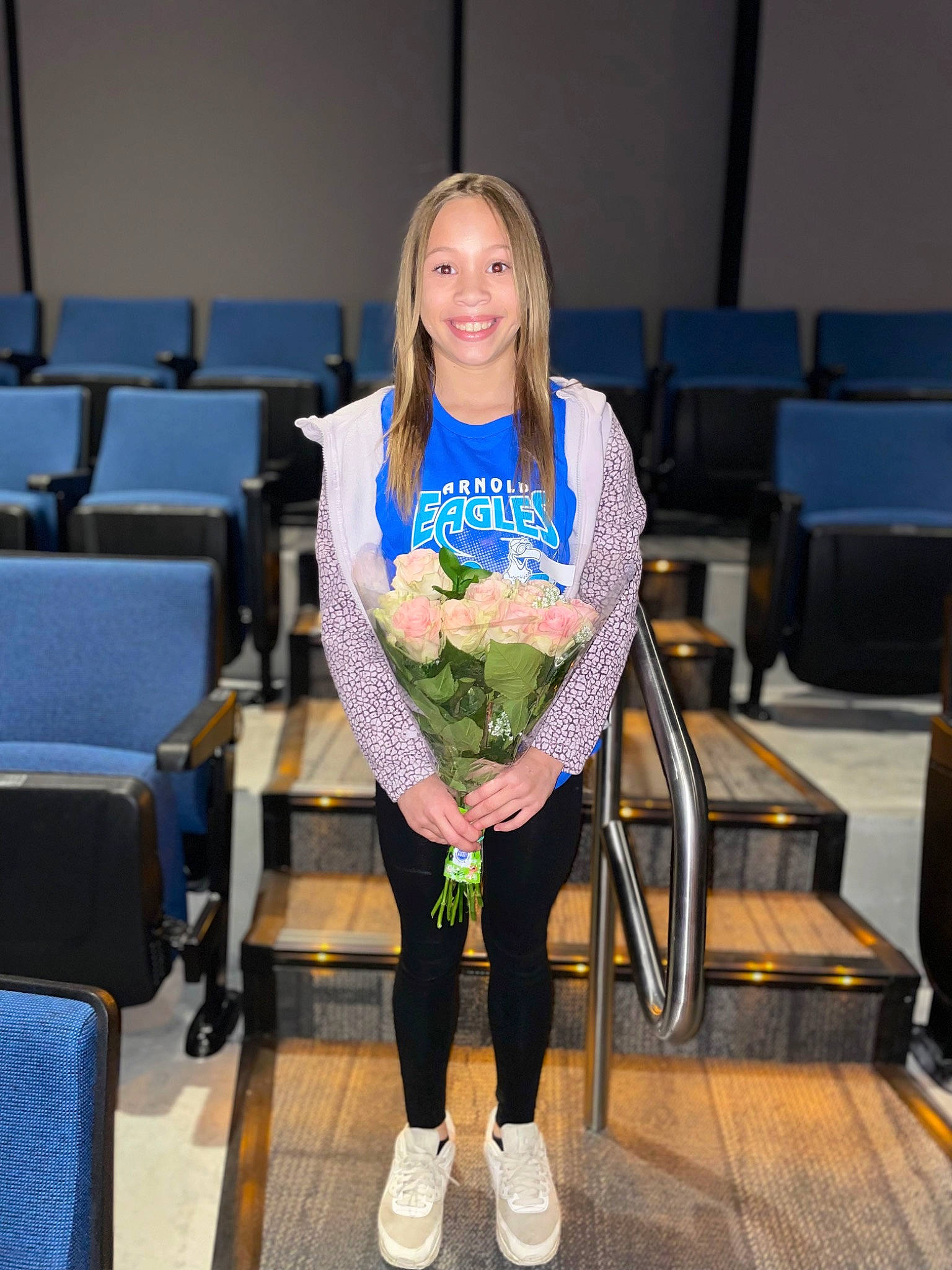 Arianna joined the competition — help win amazing prizes! boot, chair, electric_blue, event, fashion, fashion_design, fun, high_heels, human_leg, jewellery, joy, knee, leisure, necklace, person, recreation, sitting, smile, sportswear, t_shirt