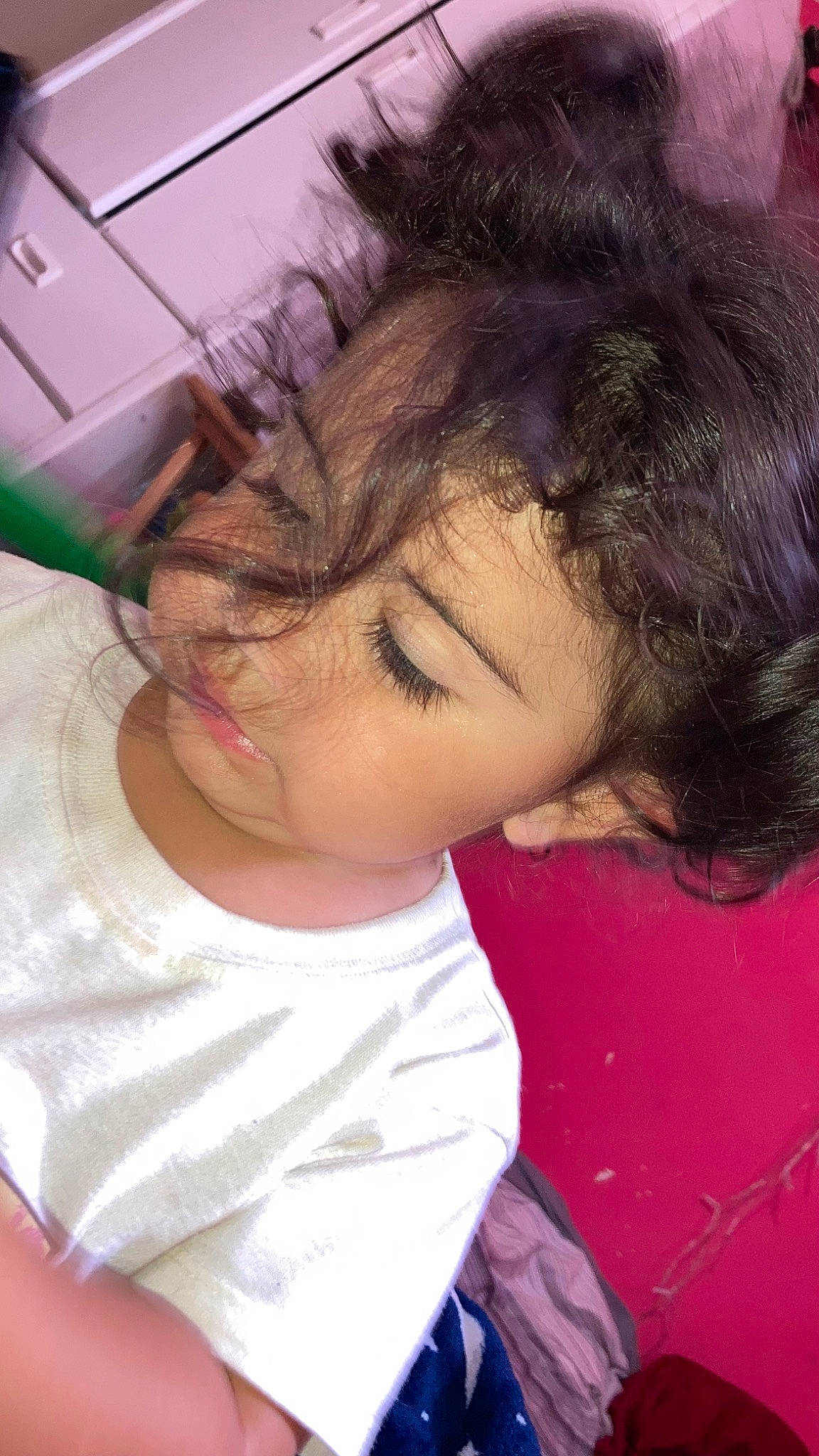 Lila is registered to the contest to win money with this photo: baby_toddler_clothing, bangs, black_hair, cheek, child, chin, ear, eyebrow, eyelash, forehead, fun, happy, iris, lip, long_hair, mouth, nose, person, pink, skin
