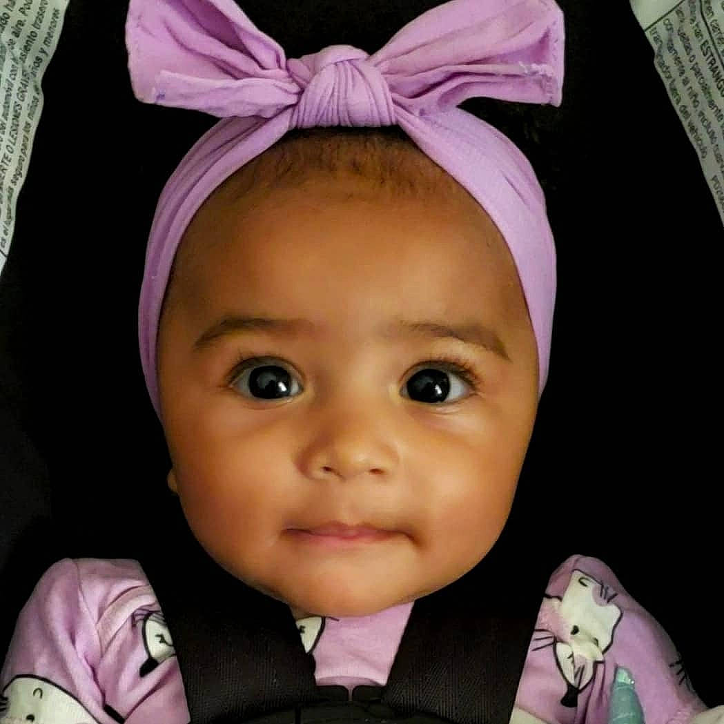 Crayton is registered to the contest to win money with this photo: black, cheek, chin, cool, eye, eyebrow, eyelash, face, green, hair, head, iris, nose, person, photograph, pink, purple, skin, sleeve, violet