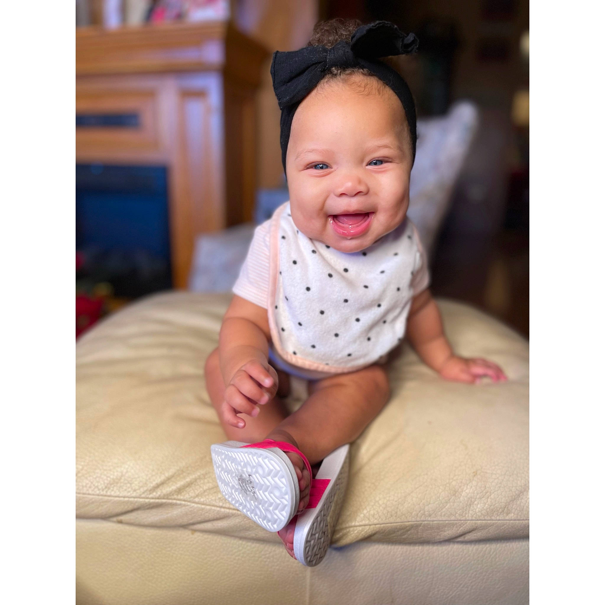Mylah is registered to the contest to win money with this photo: baby, baby_toddler_clothing, cheek, chin, collar, comfort, dress, eye, foot, happy, head, human_body, neck, pattern, person, skin, sleeve, smile, t_shirt, thigh