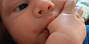Elyjah joined the competition — help win amazing prizes! baby, infant, face, hand, pacifier, blanket, closeup, skin, cute, child, newborn, indoors, soft, expression, small, person, young, clothing, blue, focus