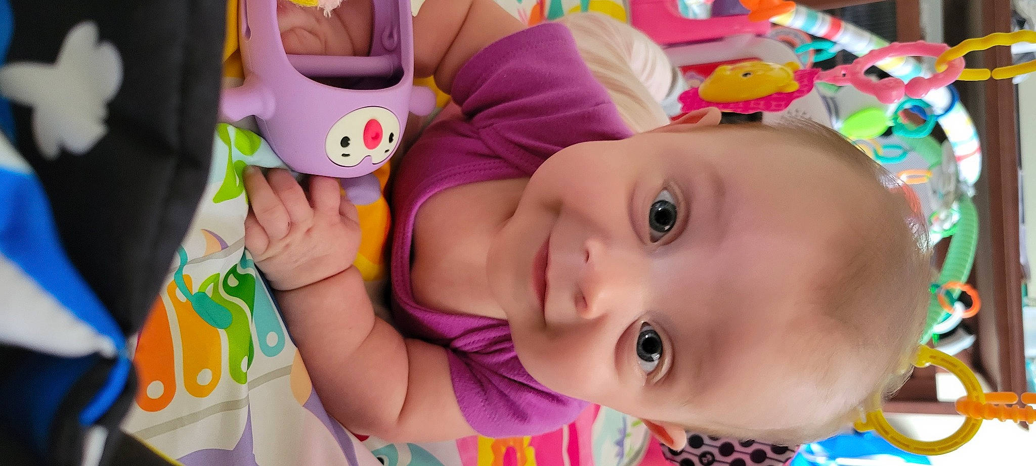 Cassidy joined the competition — help win amazing prizes! cheek, eyelash, facial_expression, fun, happy, head, mammal, mouth, nose, organ, person, photograph, pink, product, purple, skin, smile, textile, toddler, violet