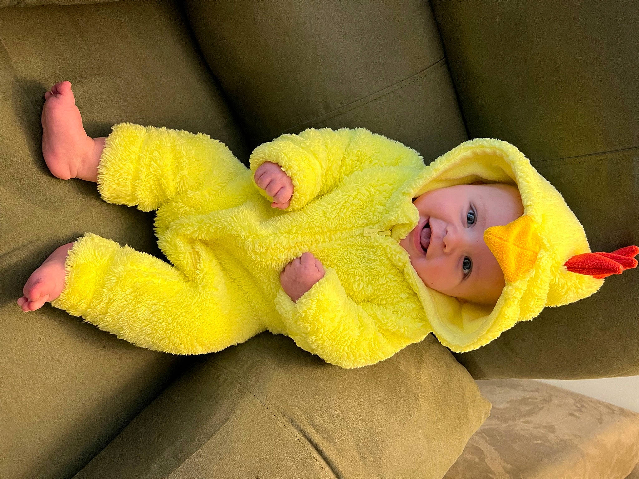 Jaxson is registered to the contest to win money with this photo: baby, baby_products, baby_toddler_clothing, baby_toys, child, comfort, couch, fun, happy, headwear, human_body, human_leg, linens, person, plush, room, smile, sock, stuffed_toy, toddler