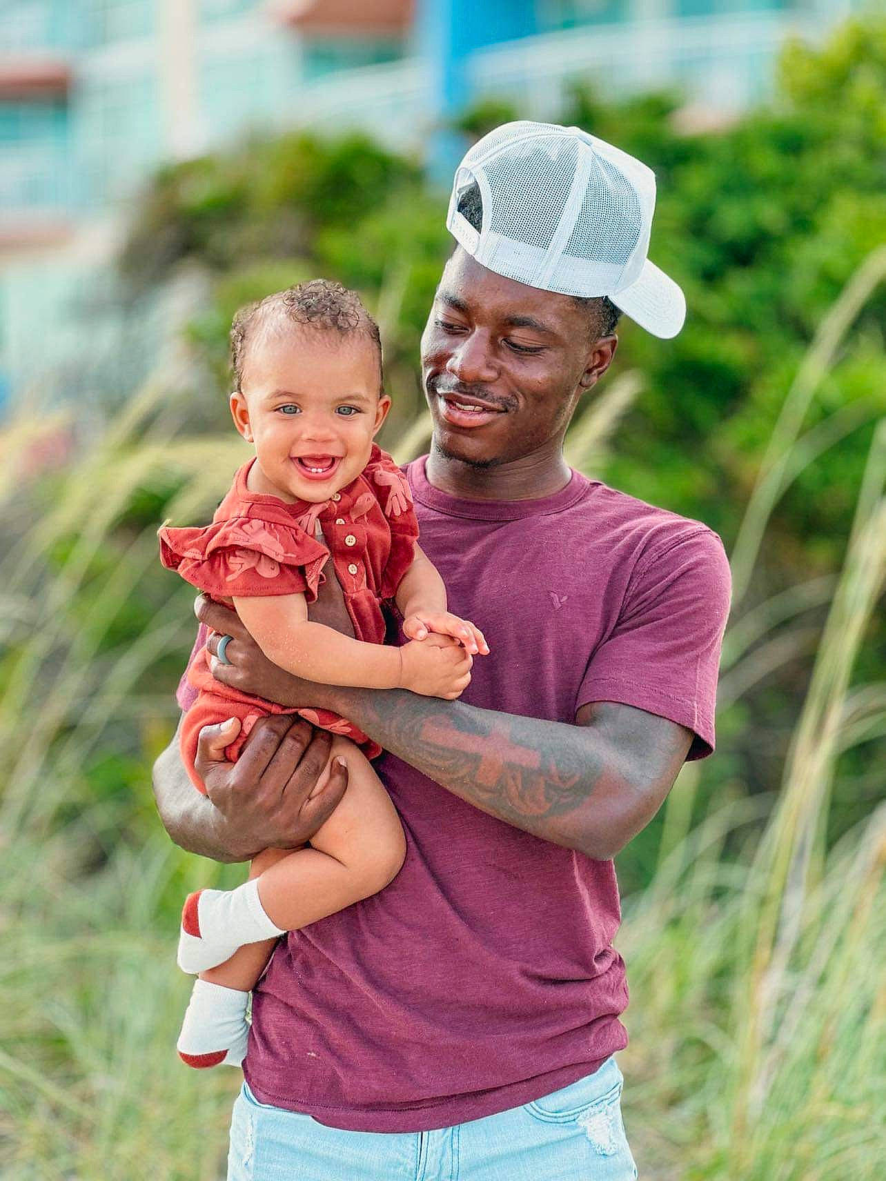 Royalty joined the competition — help win amazing prizes! baseball_cap, cap, child, clothing, event, fun, gesture, grass, happy, hat, headwear, joy, landscape, leisure, people, people_in_nature, person, pink, plant, recreation