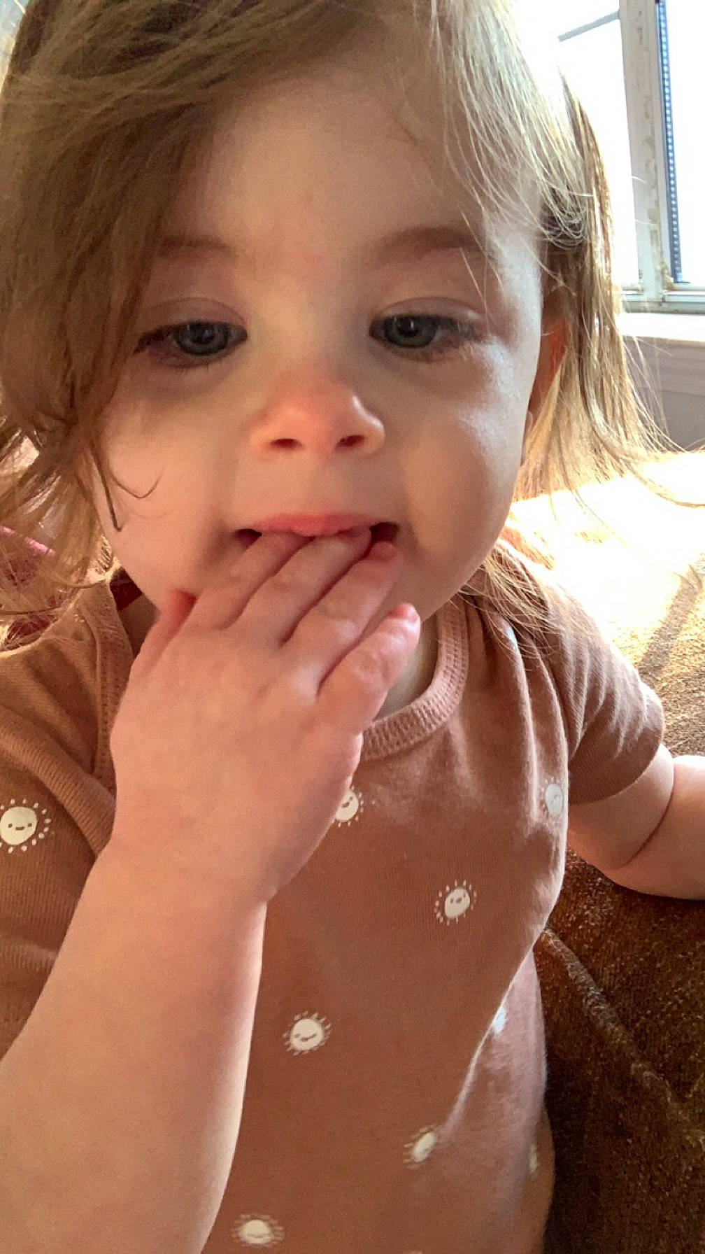 Penelope is registered to the contest to win money with this photo: baby_toddler_clothing, cheek, cool, ear, eyelash, face, finger, gesture, hand, happy, iris, lip, mouth, neck, nose, person, skin, sleeve, smile, toddler