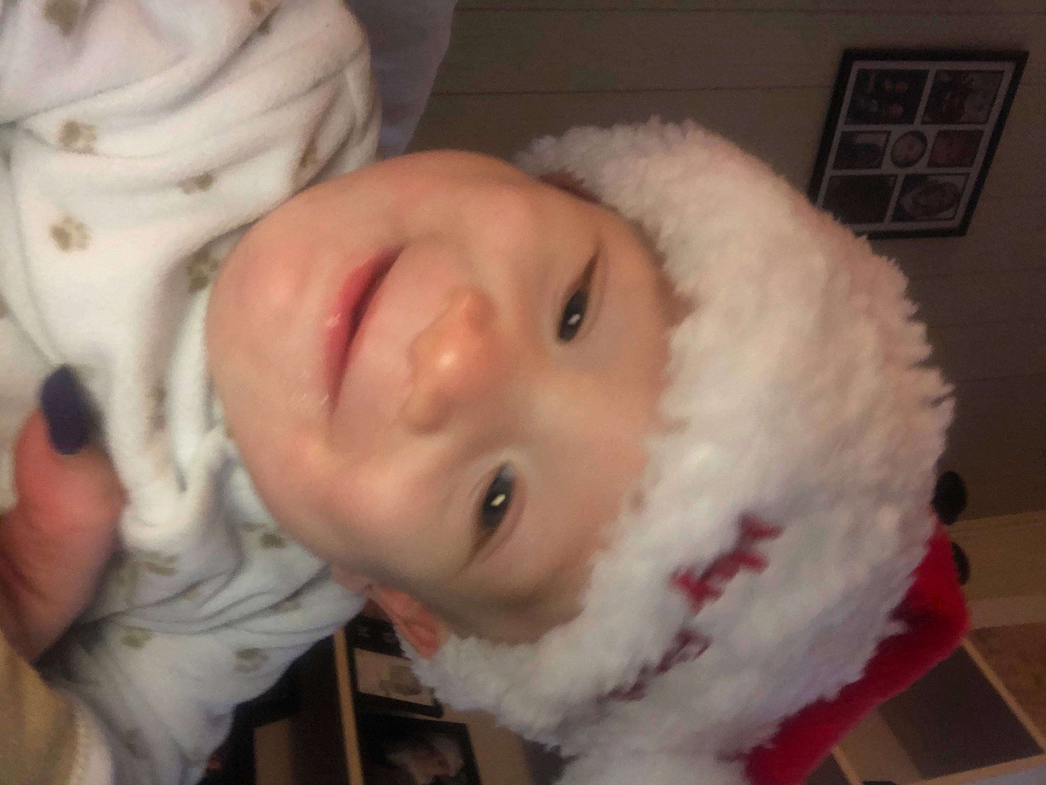 Leland is registered to the contest to win money with this photo: baby, cheek, child, ear, eye, face, fur, head, headwear, joy, lip, mouth, nose, person, skin, toddler