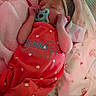 Raelynn is registered to the contest to win money with this photo: baby, child, clothing, cozy, cute, headband, heart_pattern, indoors, infant, newborn, pacifier, peaceful, pink_blanket, portrait, red_bow, resting, sleeping, small_hands, soft_texture, wrapped