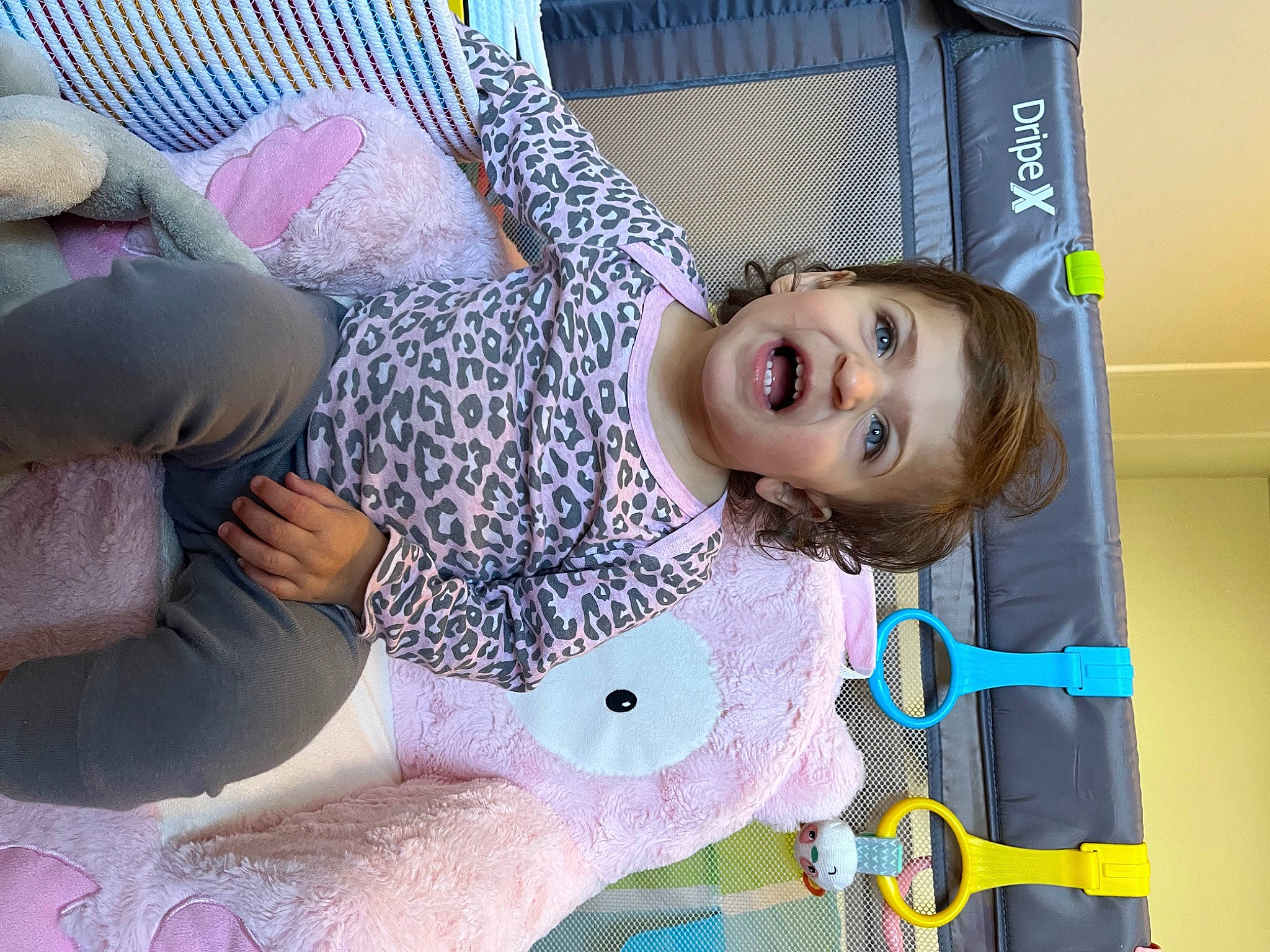 Nova Rae joined the competition — help win amazing prizes! arm, baby_products, child, comfort, fun, happy, leisure, linens, pattern, person, pink, room, sitting, smile, textile, thigh, toddler