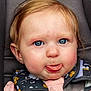 baby, close_up, blue_eyes, tongue_out, cute, infant, car_seat, floral_pattern, pink_clothing, expression, face, child, seatbelt, head, skin, person, portrait, young, baby_girl, funny_face