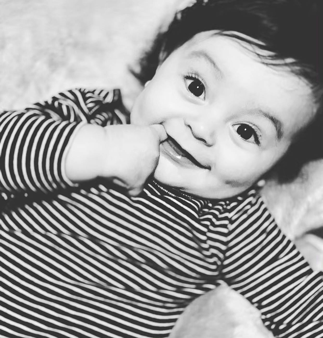 Elian is registered to the contest to win money with this photo: baby, black_and_white, child, child_model, eye, joy, monochrome, nose, person, photograph, photography, portrait, portrait_photography, smile, toddler