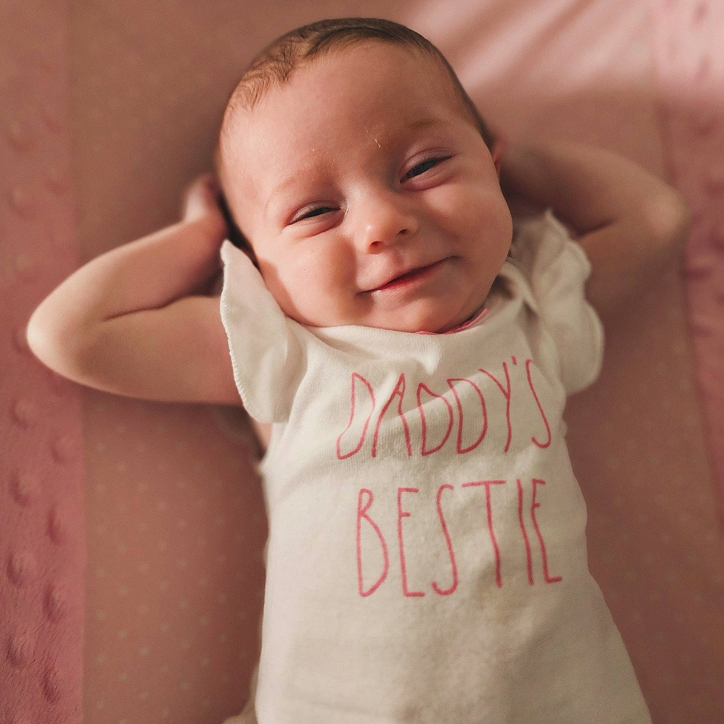 Leia is registered to the contest to win money with this photo: baby, baby_toddler_clothing, cheek, child, comfort, eye, face, hair, happy, head, joy, linens, lip, mouth, nose, person, skin, sleeve, smile, t_shirt