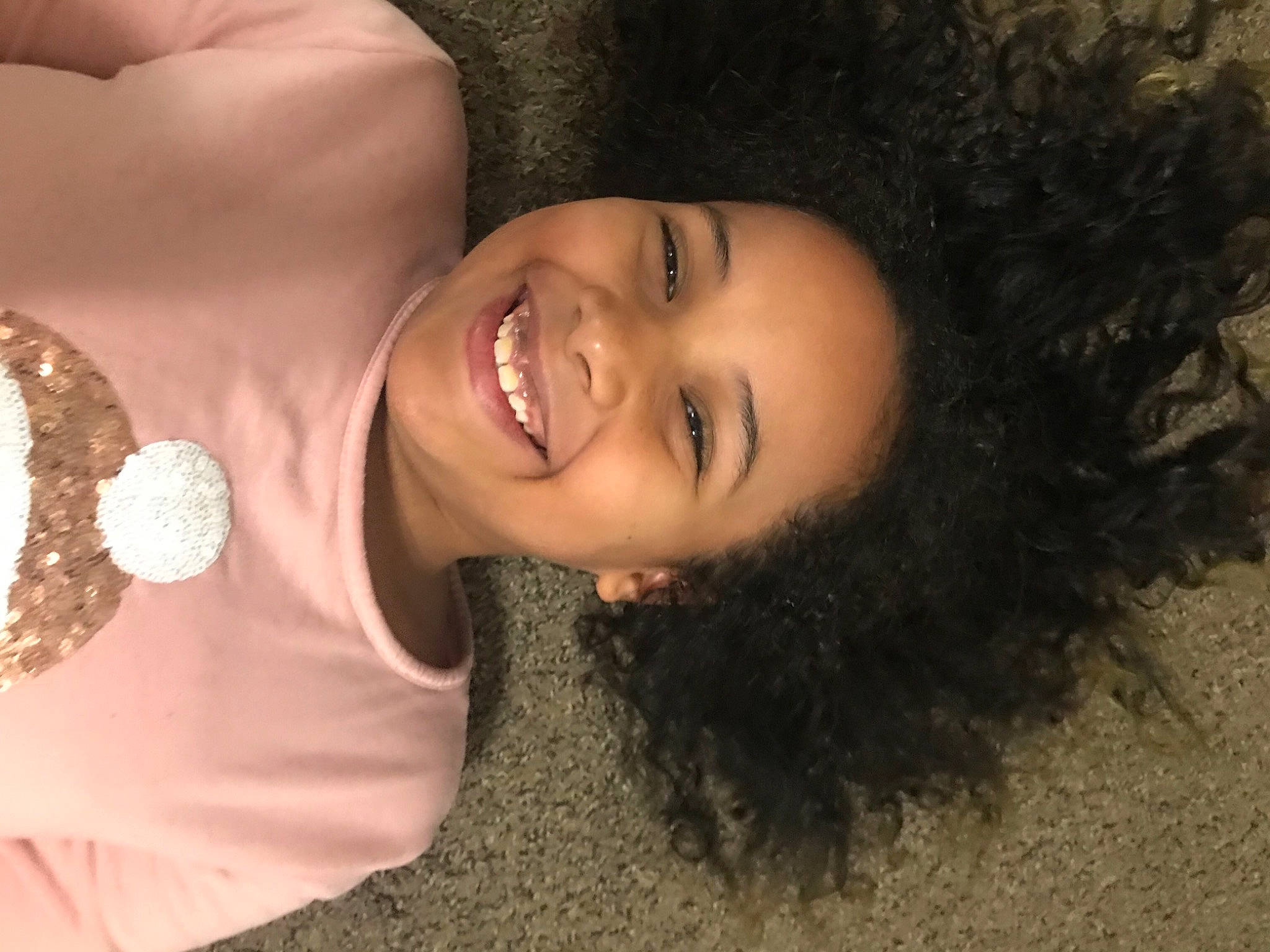 Jazlyn is registered to the contest to win money with this photo: black_hair, earrings, eye, eyebrow, eyelash, flash_photography, fun, gesture, grass, happy, head, human_body, jaw, joy, lip, long_hair, nose, person, plant, skin