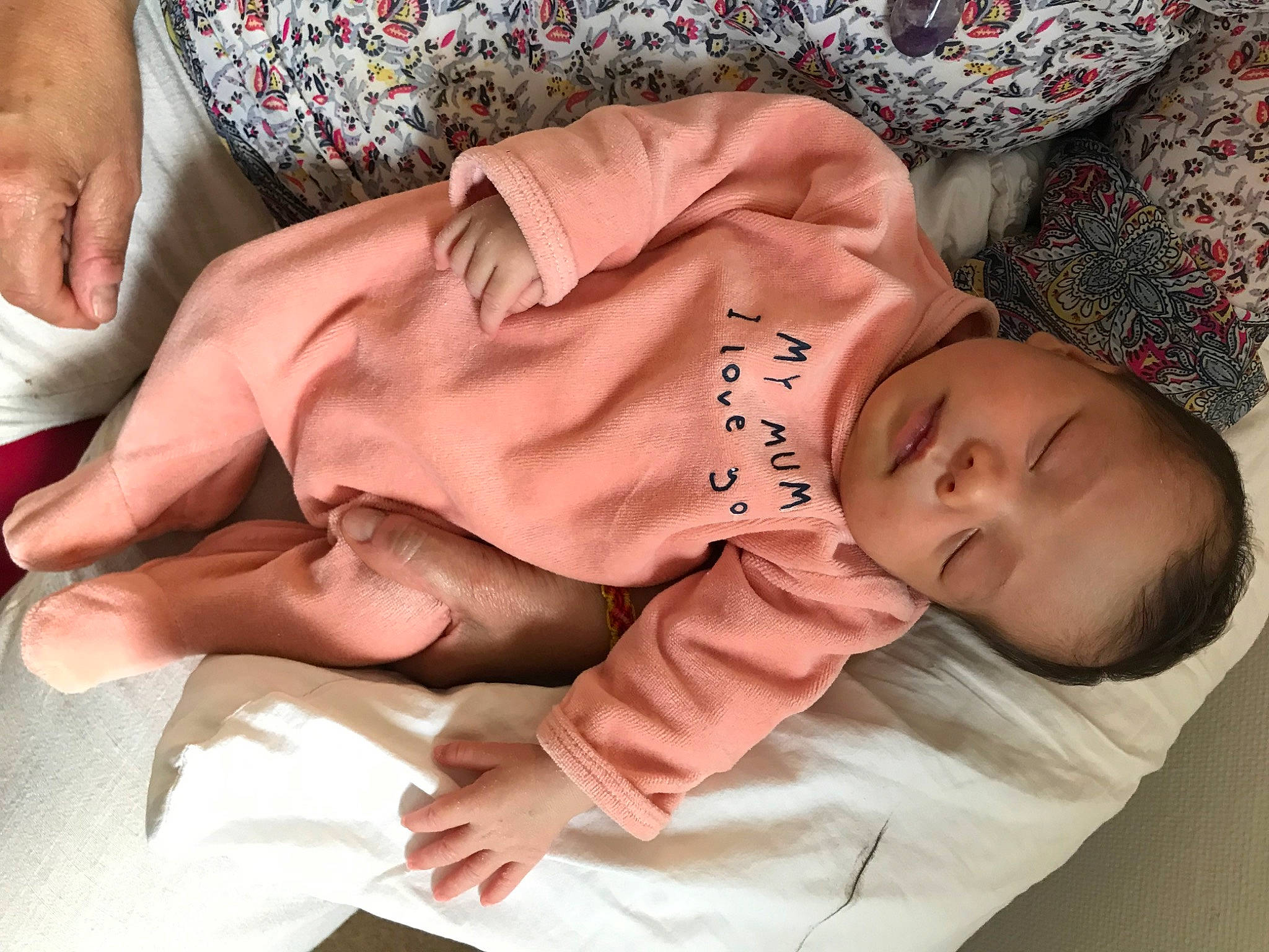 April participe au concours pour gagner de l'argent avec cette photo : baby, baby_sleeping, baby_toddler_clothing, cheek, chest, child, comfort, facial_expression, finger, gesture, hand, head, human_body, mouth, person, product, skin, sleeve, thumb, toddler