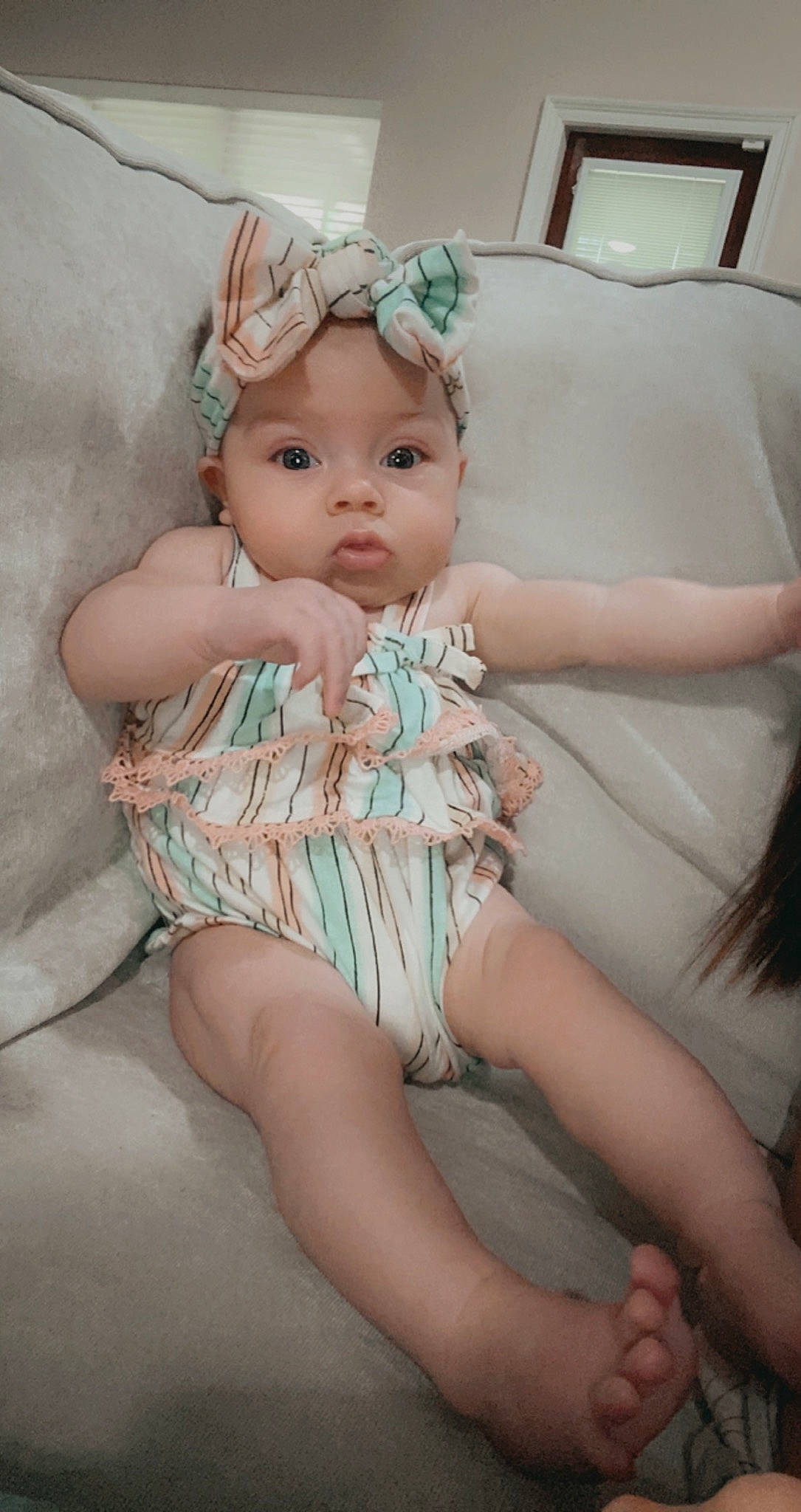 Brynley is registered to the contest to win money with this photo: baby_toddler_clothing, day_dress, dress, embellishment, eye, eyelash, fashion, finger, flash_photography, happy, head, headgear, headpiece, headwear, human_body, iris, lip, nail, person, pink